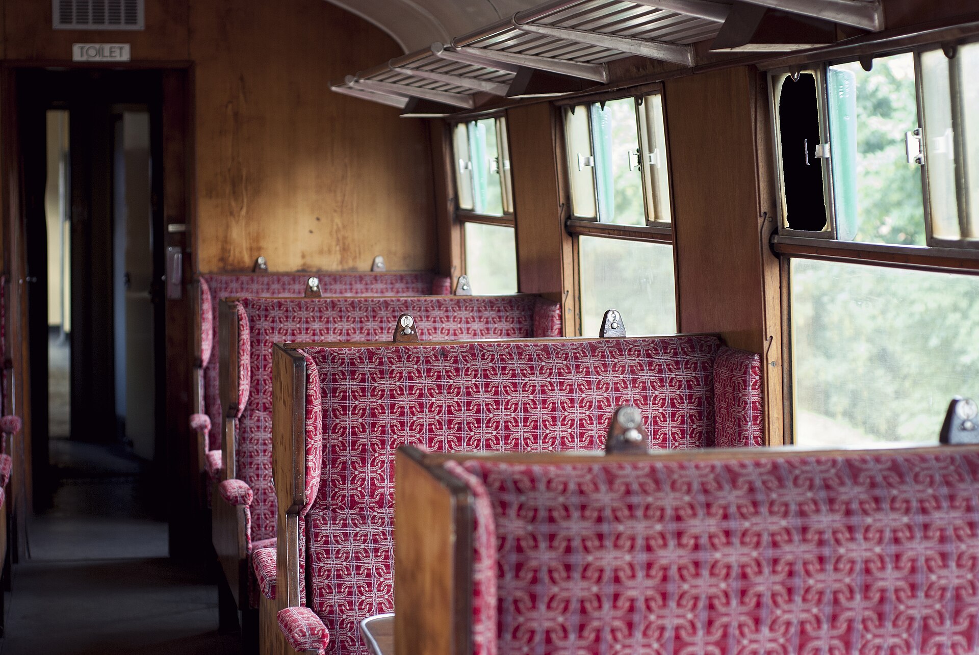 Vintage British railway carriage interior (Unsplash)